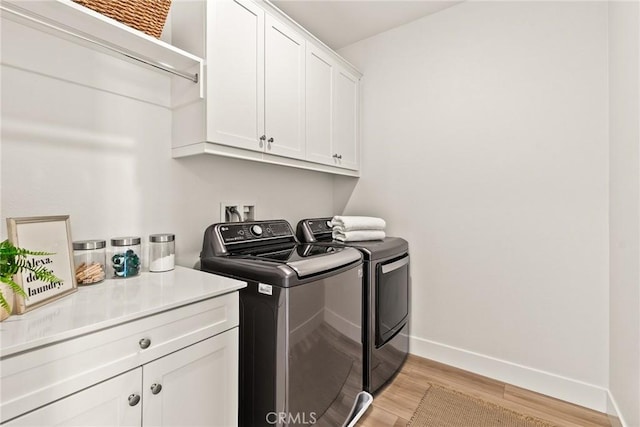 27636 S Evergreen Pl, San Pedro, CA 90732 - laundry area with separate washer and dryer, cabinet space, and light wood-type flooring