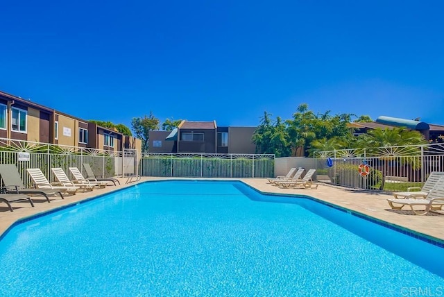 3454 Castle Glen Dr Unit 115, San Diego, CA 92123 - community pool featuring a patio