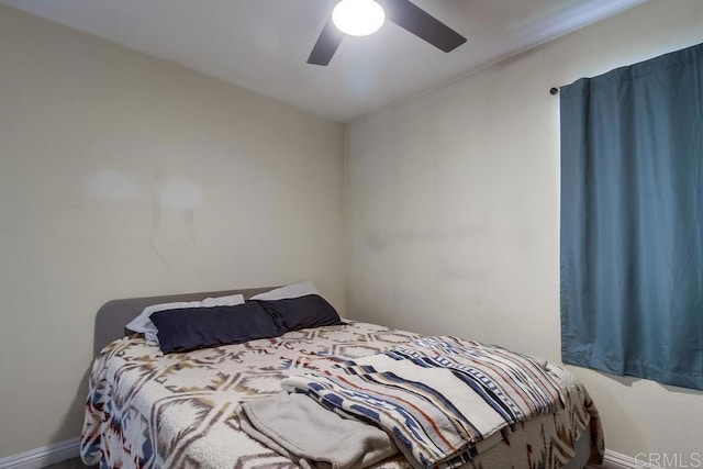 3454 Castle Glen Dr Unit 115, San Diego, CA 92123 - bedroom featuring baseboards and ceiling fan