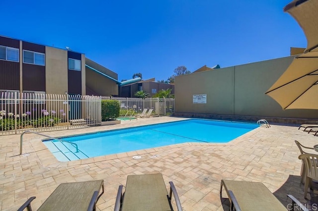 3454 Castle Glen Dr Unit 115, San Diego, CA 92123 - community pool featuring a patio area