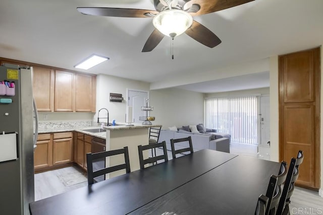 3454 Castle Glen Dr Unit 115, San Diego, CA 92123 - dining space featuring light wood finished floors and ceiling fan