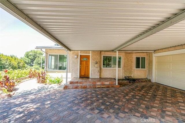 10919 Terecita Rd, Tujunga, CA 91042 - entrance to property with stucco siding and a carport