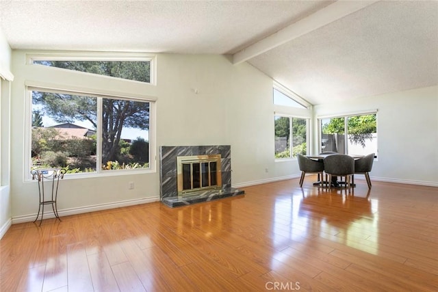 10919 Terecita Rd, Tujunga, CA 91042 - living room with a textured ceiling, a high end fireplace, and wood finished floors