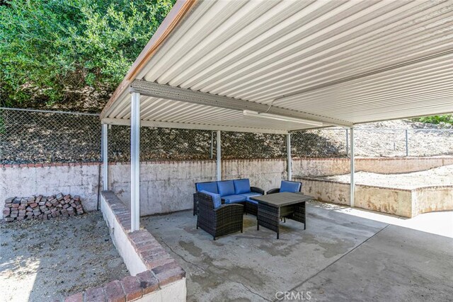 10919 Terecita Rd, Tujunga, CA 91042 - fenced backyard featuring a patio area and an outdoor living space
