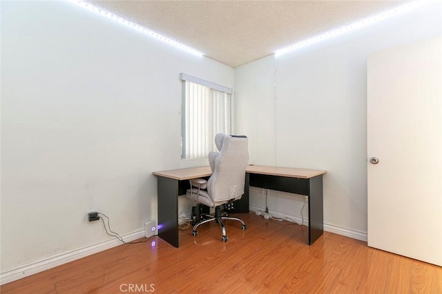10919 Terecita Rd, Tujunga, CA 91042 - office area with wood finished floors and a textured ceiling