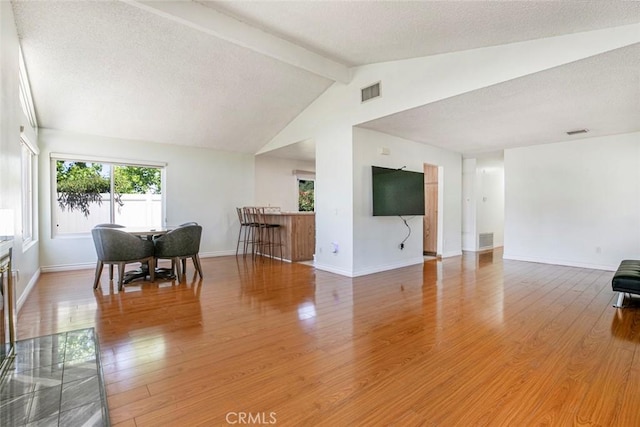 10919 Terecita Rd, Tujunga, CA 91042 - living area featuring light wood-style flooring and a textured ceiling