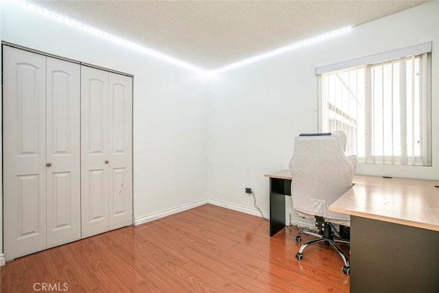 10919 Terecita Rd, Tujunga, CA 91042 - office space featuring wood finished floors and a textured ceiling