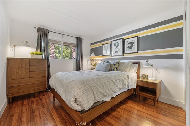 2825 N Los Felices Rd Unit 211, Palm Springs, CA 92262 - bedroom with wood finished floors and baseboards