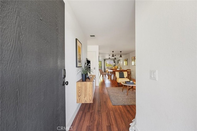 2825 N Los Felices Rd Unit 211, Palm Springs, CA 92262 - corridor with wood finished floors and baseboards