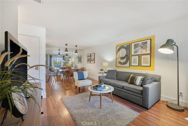 2825 N Los Felices Rd Unit 211, Palm Springs, CA 92262 - living area with wood finished floors