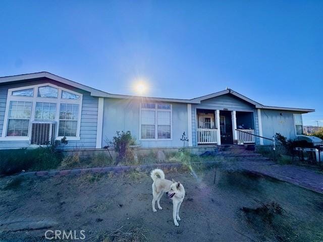 6475 105th St W, Rosamond, CA 93560 - view of front facade featuring covered porch
