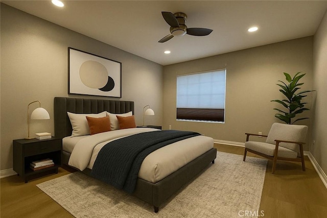 21520 Burbank Blvd Unit 116, Woodland Hills, CA 91367 - bedroom with recessed lighting, light wood-style floors, and a ceiling fan