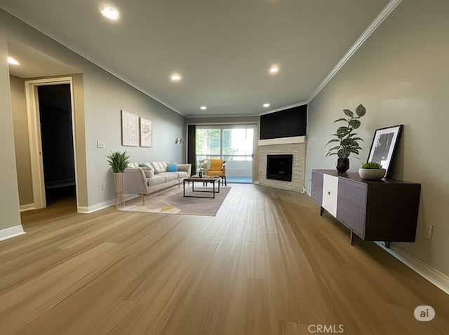 21520 Burbank Blvd Unit 116, Woodland Hills, CA 91367 - living area with ornamental molding, wood finished floors, a fireplace, and recessed lighting