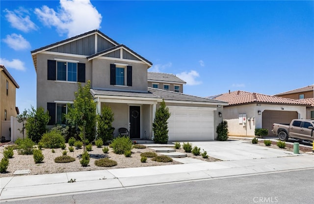 5756 Quicksilver Way, Banning, CA 92220 - view of front of home featuring stucco siding, an attached garage, driveway, and a tile roof