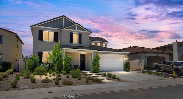 5756 Quicksilver Way, Banning, CA 92220 - view of front of home with concrete driveway, a garage, stucco siding, and a tiled roof