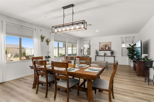 5756 Quicksilver Way, Banning, CA 92220 - dining room featuring plenty of natural light, light wood finished floors, and recessed lighting