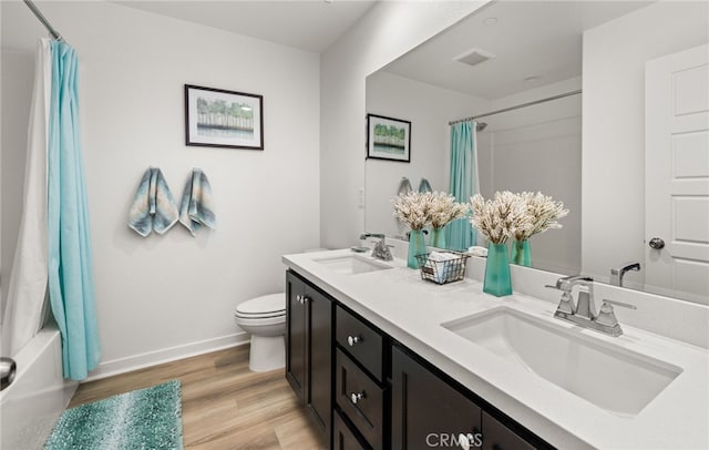 5756 Quicksilver Way, Banning, CA 92220 - bathroom with double vanity, wood finished floors, and shower / bath combination with curtain