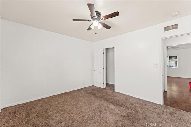 5609 Beach St, Jurupa Valley, CA 92509 - unfurnished bedroom with carpet flooring and ceiling fan