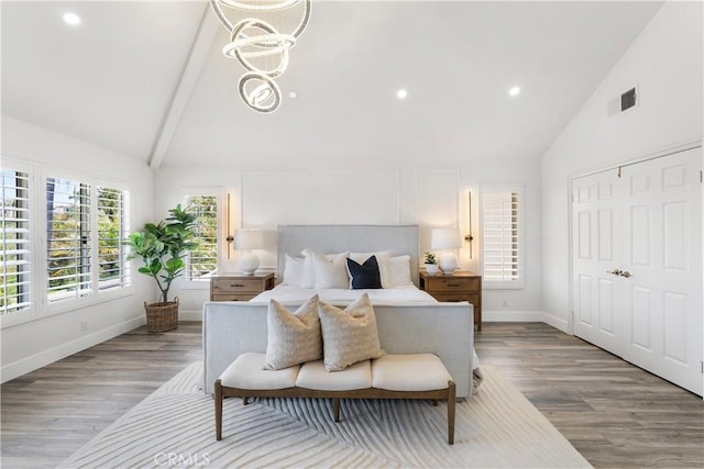 1213 Via Visalia, San Clemente, CA 92672 - bedroom with high vaulted ceiling, wood finished floors, beam ceiling, and recessed lighting
