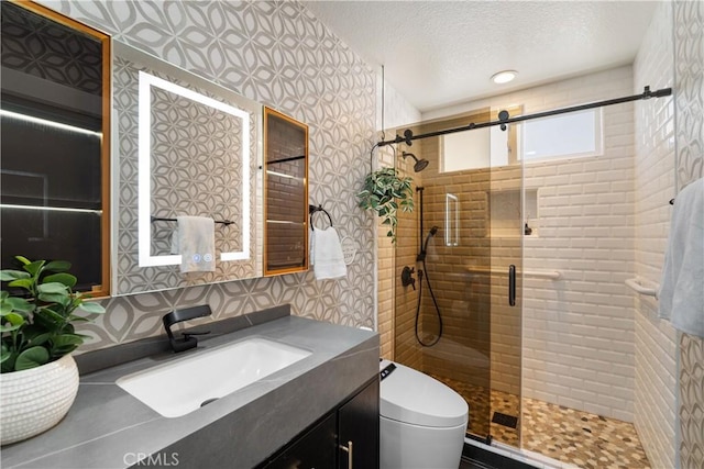1213 Via Visalia, San Clemente, CA 92672 - bathroom with vanity, a shower stall, and a textured ceiling