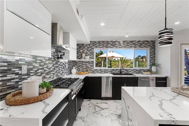 1213 Via Visalia, San Clemente, CA 92672 - kitchen featuring wall chimney exhaust hood, dark cabinets, stainless steel gas cooktop, modern cabinets, and light marble finish flooring