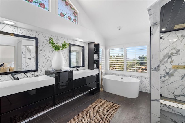 1213 Via Visalia, San Clemente, CA 92672 - bathroom with vanity, a soaking tub, healthy amount of natural light, a marble finish shower, and high vaulted ceiling