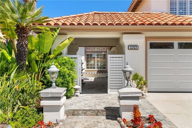1213 Via Visalia, San Clemente, CA 92672 - view of exterior entry featuring a tile roof and stucco siding