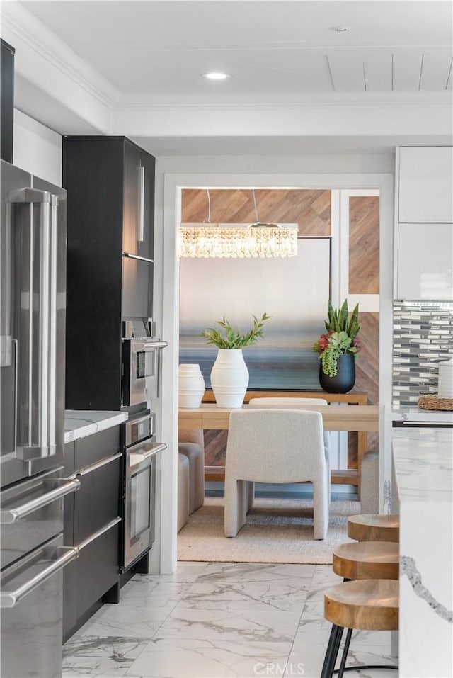 1213 Via Visalia, San Clemente, CA 92672 - interior space with light marble finish floors, crown molding, a chandelier, and recessed lighting
