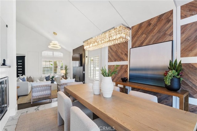 1213 Via Visalia, San Clemente, CA 92672 - dining space with a chandelier, high vaulted ceiling, and a fireplace