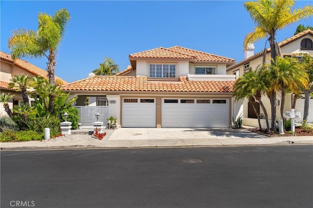 1213 Via Visalia, San Clemente, CA 92672 - mediterranean / spanish house with stucco siding, a tile roof, concrete driveway, and an attached garage