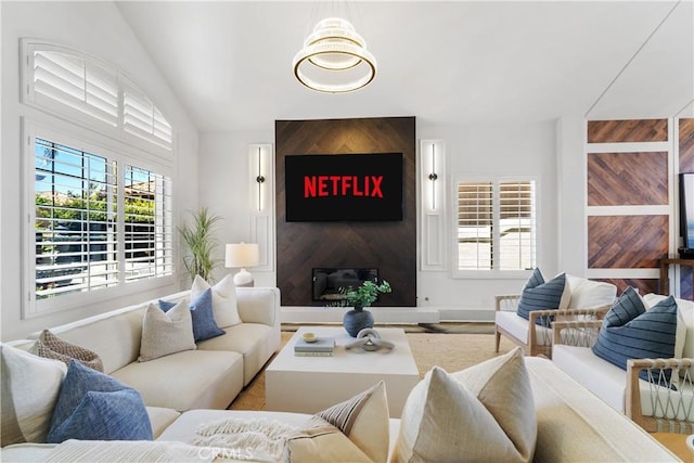 1213 Via Visalia, San Clemente, CA 92672 - living room with lofted ceiling, a large fireplace, and wood finished floors