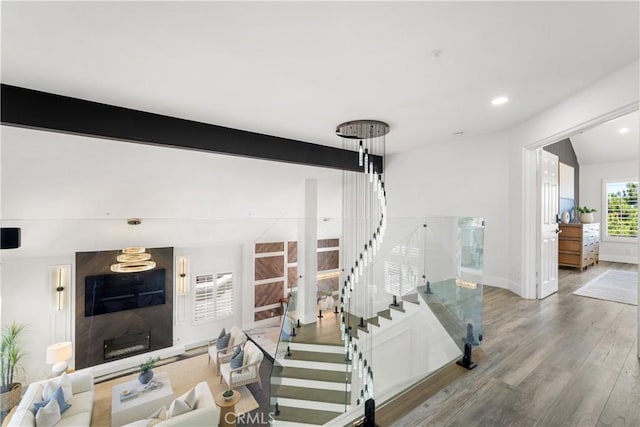 1213 Via Visalia, San Clemente, CA 92672 - stairs with wood finished floors, recessed lighting, a large fireplace, and beam ceiling