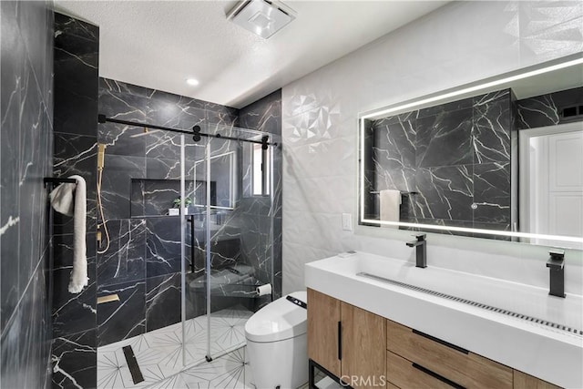 1213 Via Visalia, San Clemente, CA 92672 - bathroom with vanity, tile walls, a marble finish shower, and recessed lighting