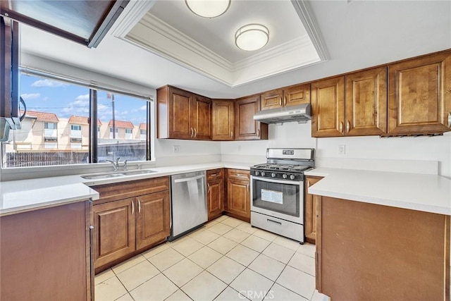 208 N Nicholson Ave Unit B, Monterey Park, CA 91755 - kitchen featuring appliances with stainless steel finishes, under cabinet range hood, a tray ceiling, ornamental molding, and brown cabinetry