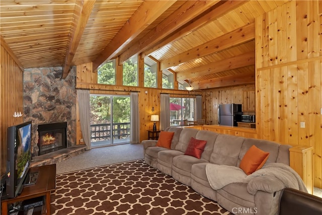 33469 Squirrel Dr, Green Valley Lake, CA 92341 - living room with carpet flooring, wooden walls, a fireplace, and wood ceiling