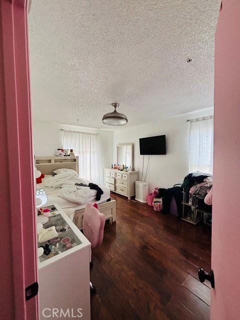215 S 5th St, Alhambra, CA 91801 - bedroom with hardwood / wood-style floors and a textured ceiling