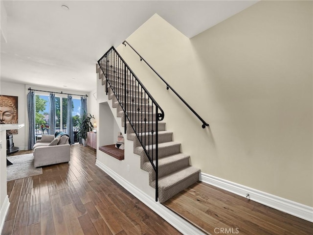 5753 White Oak Ave Unit 3, Encino, CA 91316 - stairs with wood finished floors and baseboards