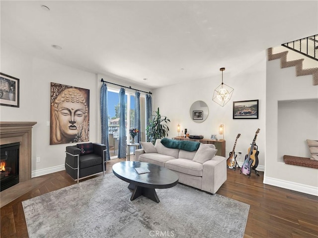 5753 White Oak Ave Unit 3, Encino, CA 91316 - living room with a glass covered fireplace, stairs, and wood finished floors