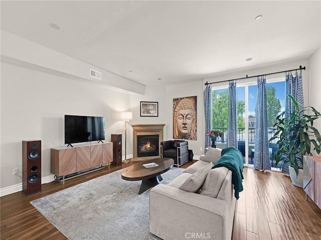 5753 White Oak Ave Unit 3, Encino, CA 91316 - living area with wood finished floors and a glass covered fireplace