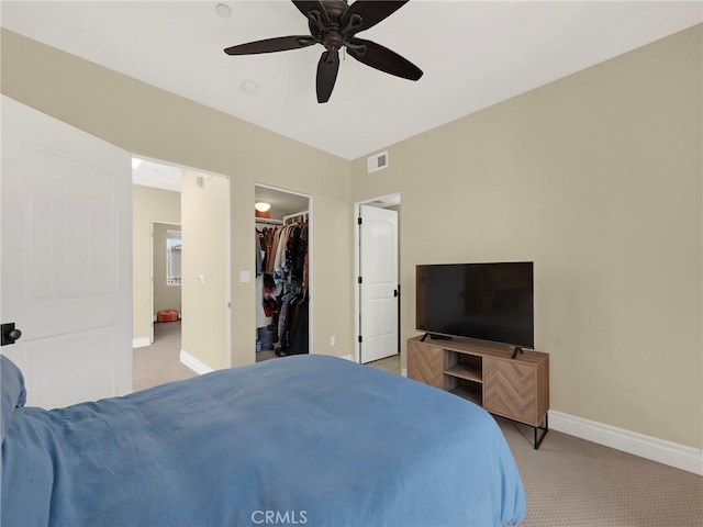 5753 White Oak Ave Unit 3, Encino, CA 91316 - bedroom featuring light carpet, a walk in closet, ceiling fan, and a closet