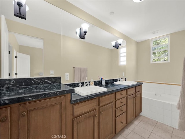 5753 White Oak Ave Unit 3, Encino, CA 91316 - bathroom with tile patterned floors, double vanity, and a bath