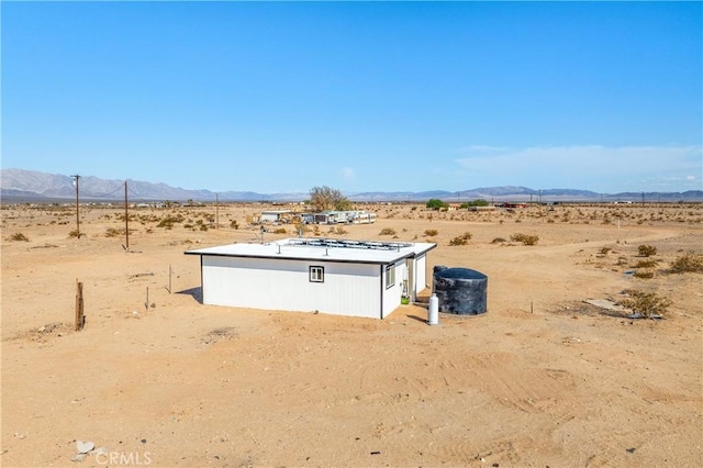 81122 Valle Vista Rd Unit 29, Palms, CA 92277 - view of outbuilding featuring view of desert landscape, a mountain view, and a view of rural / pastoral area