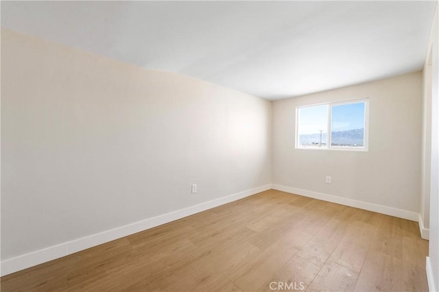 81122 Valle Vista Rd Unit 29, Palms, CA 92277 - unfurnished room with light wood-style floors and baseboards