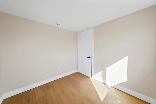 81122 Valle Vista Rd Unit 29, Palms, CA 92277 - empty room featuring wood finished floors and a smoke detector
