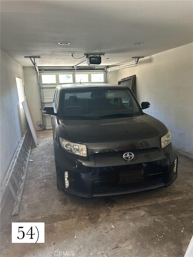 1388 N Lugo Ave, San Bernardino, CA 92404 - garage with a garage door opener