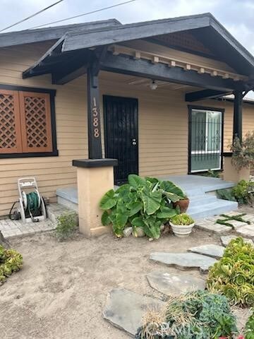 1388 N Lugo Ave, San Bernardino, CA 92404 - view of exterior entry featuring covered porch