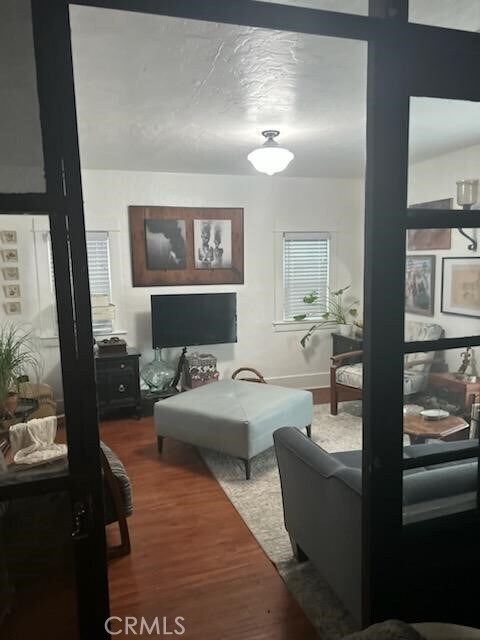 1388 N Lugo Ave, San Bernardino, CA 92404 - living room with wood finished floors