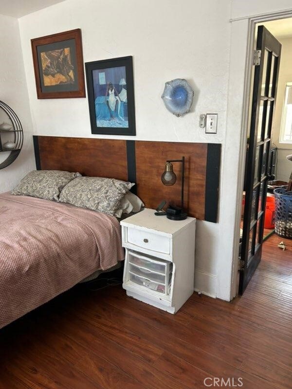 1388 N Lugo Ave, San Bernardino, CA 92404 - bedroom featuring wood finished floors