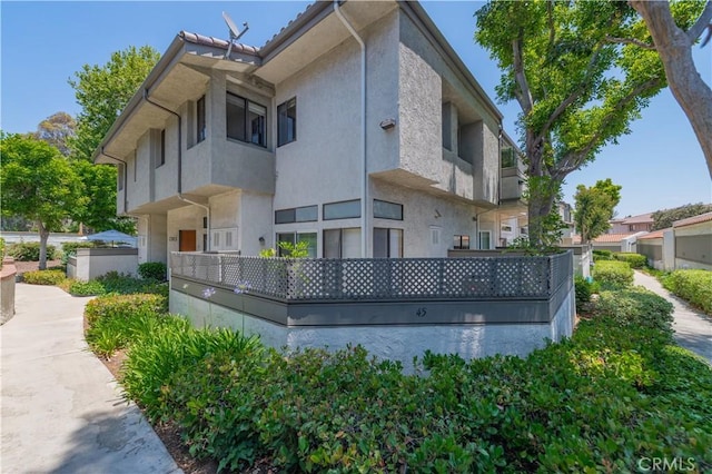 45 Willowcrest Ln, Pomona, CA 91766 - rear view of house with stucco siding