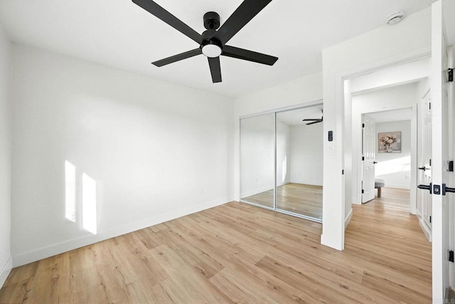 1143 Hemlock Ave, Imperial Beach, CA 91932 - unfurnished bedroom with light wood-style floors, a closet, and ceiling fan